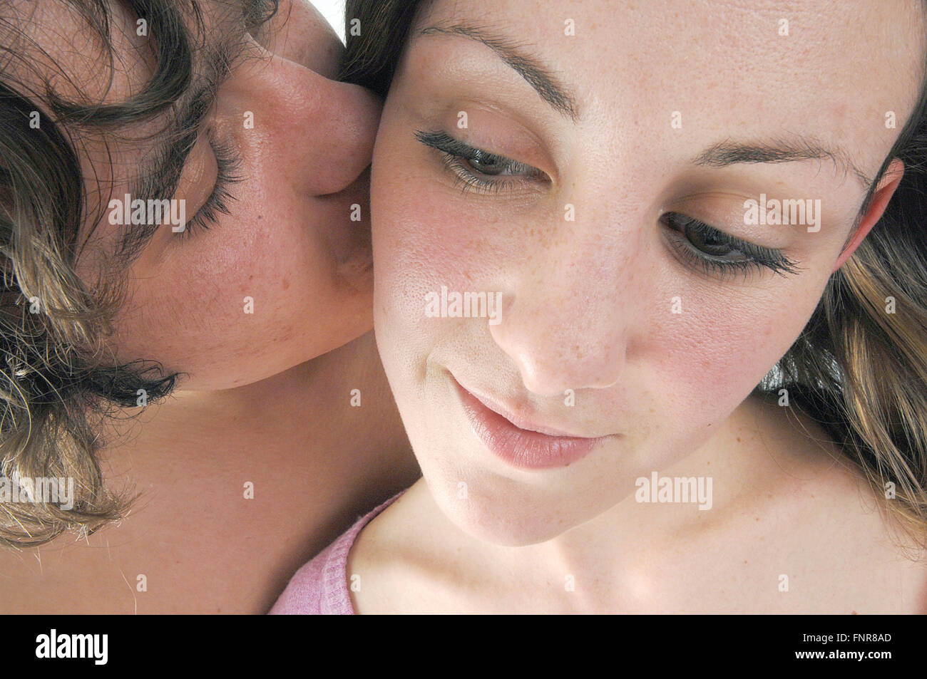 Young lovers kissing. Stock Photo