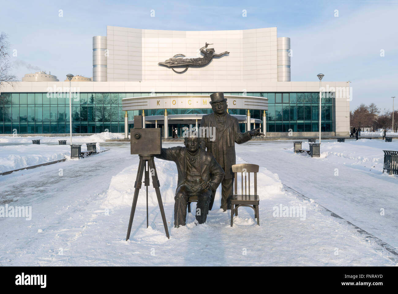 Kosmos theatre and Lumiere brothers sculpture in winter Stock Photo