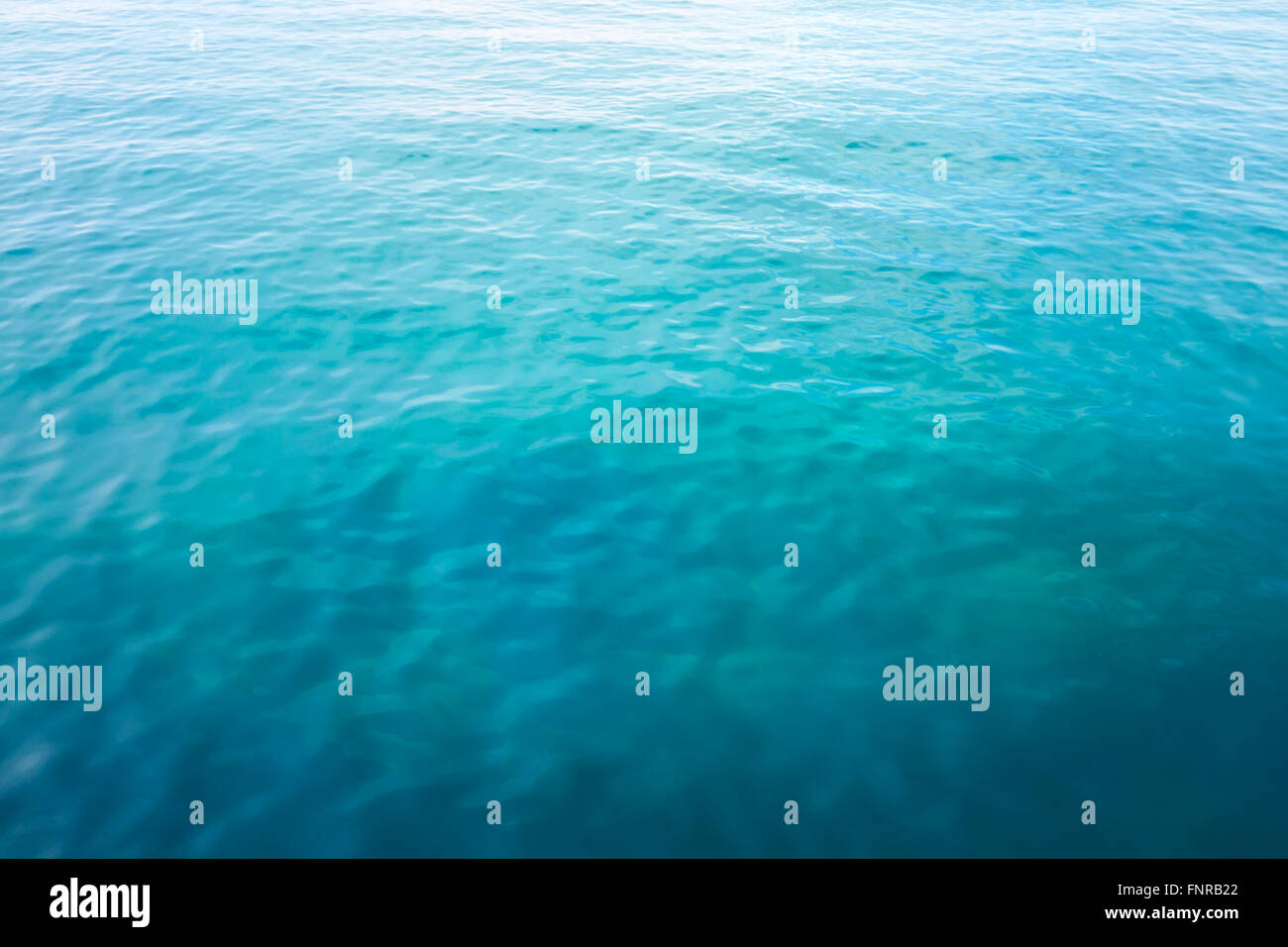 Blue water ocean with waves background Stock Photo - Alamy