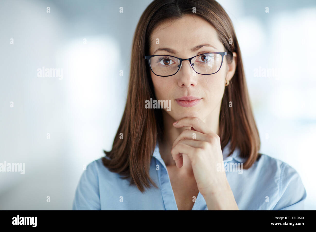 Portrait of beautiful young businesswoman wearing glasses Stock Photo -  Alamy