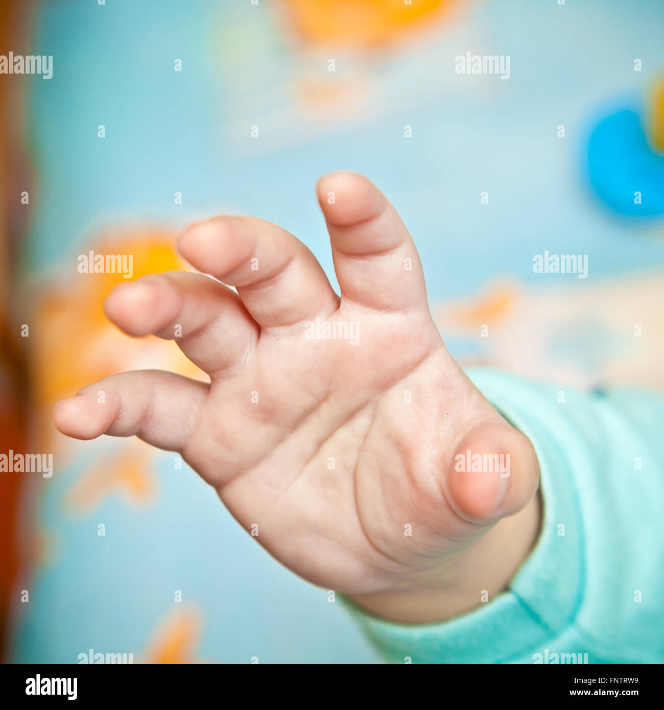 baby hand closeup, shallow depth of field Stock Photo Alamy