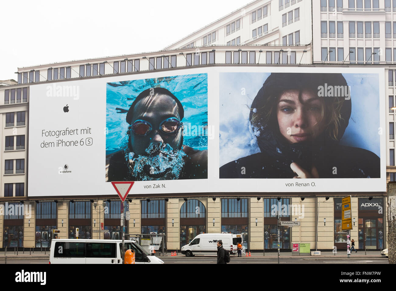 BERLIN, 11 MARCH: Huge bill board advertising panel for iPhone 6S covering a building under construction in Potsdamer Platz in B Stock Photo