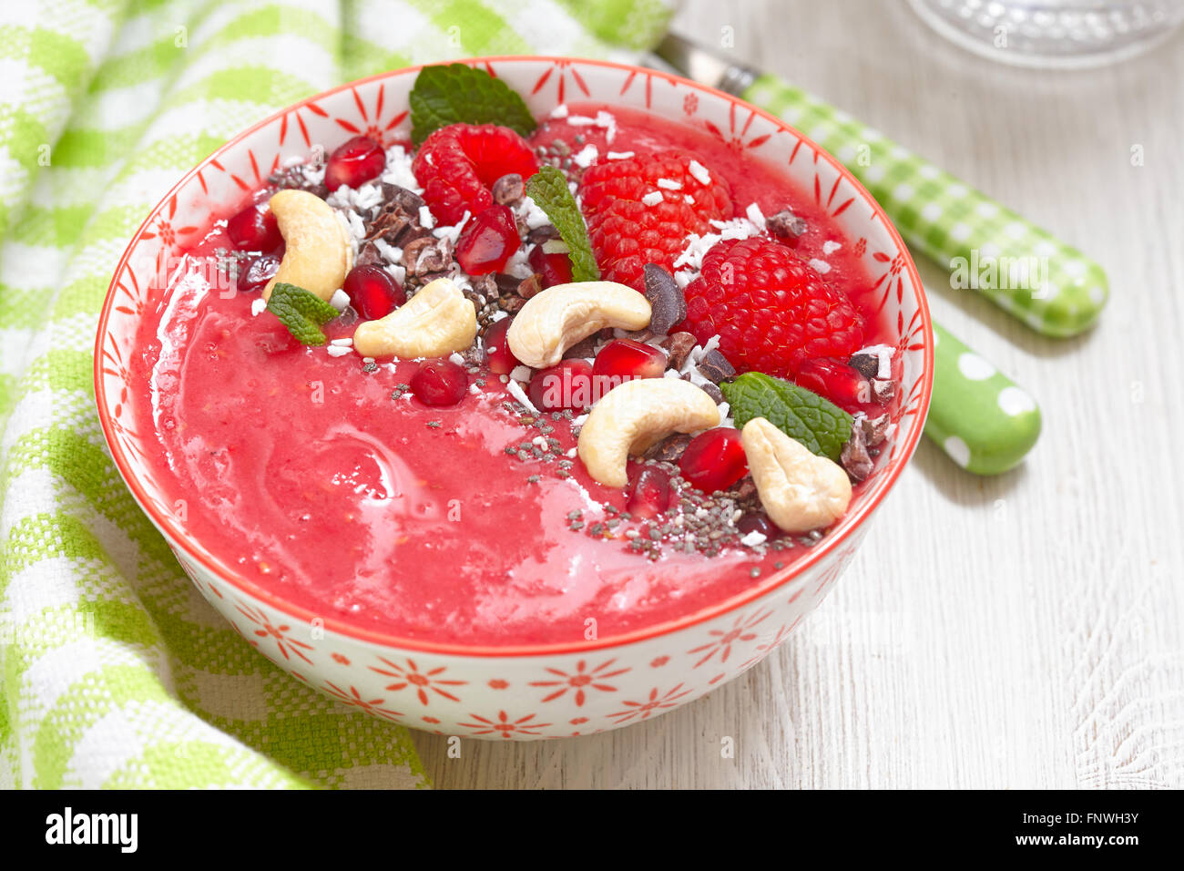 Raspberry smoothie bowl Stock Photo