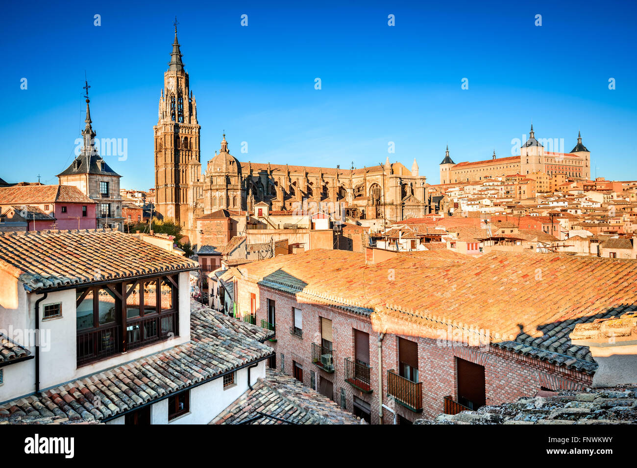 Toledo, Spain. Sunset HDR view of ancient city Toledo in Castilla la Mancha with Santa Iglesia Catedral and Alcazar. Stock Photo