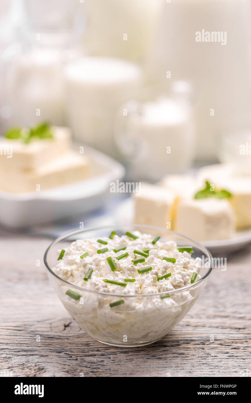 Cottage cheese with chives in glass bowl Stock Photo Alamy