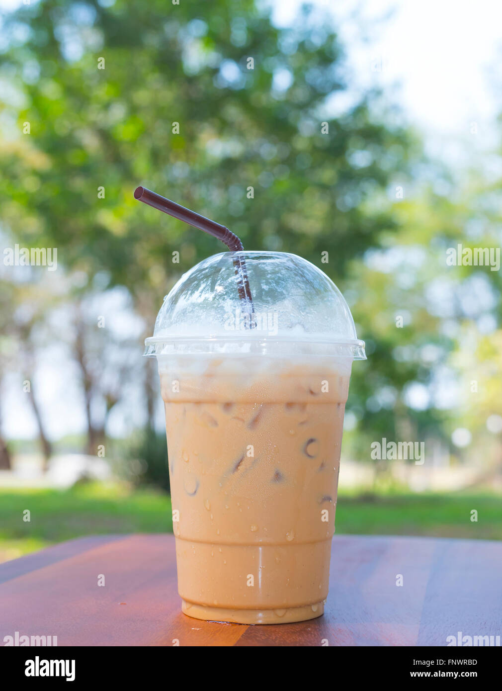 Cold milk coffee and ice in glass Stock Photo Alamy
