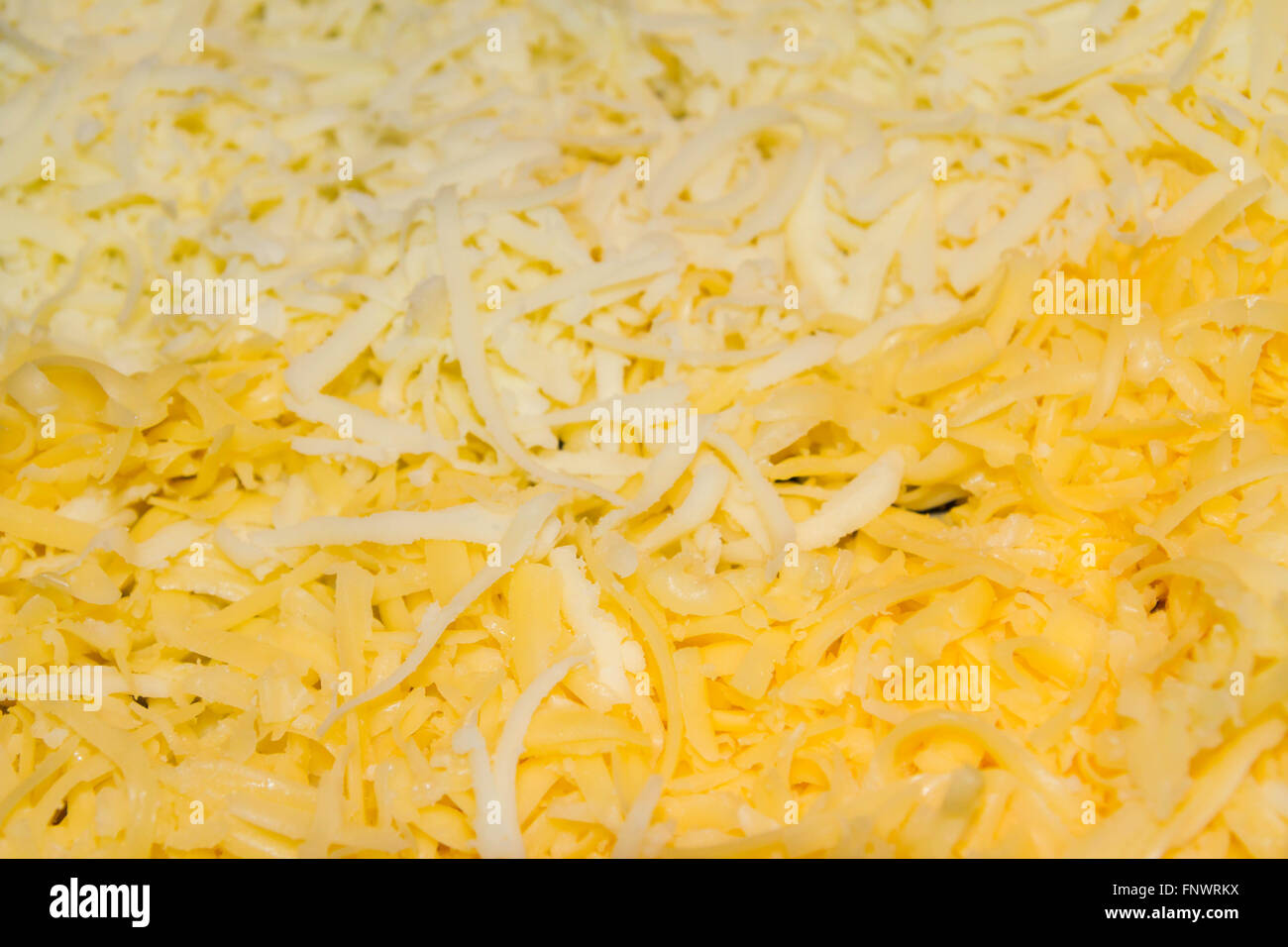 Two types of grated cheese for toppings Stock Photo Alamy