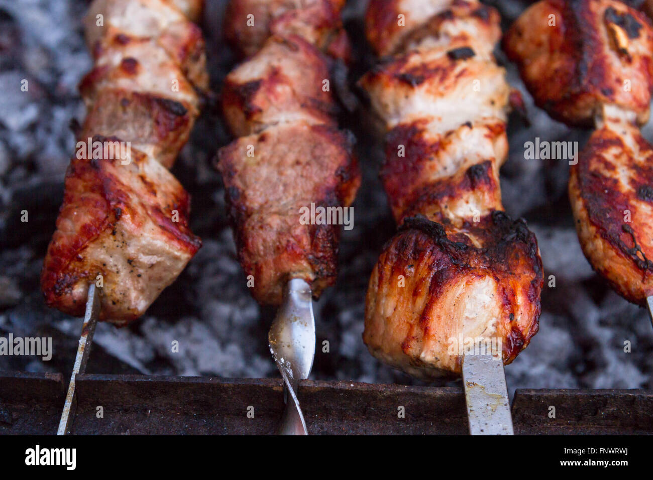 Grilled pork kebab cooked on skewers Stock Photo Alamy