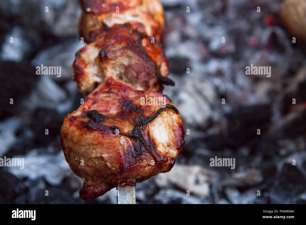 Grilled pork kebab cooked on skewers Stock Photo Alamy