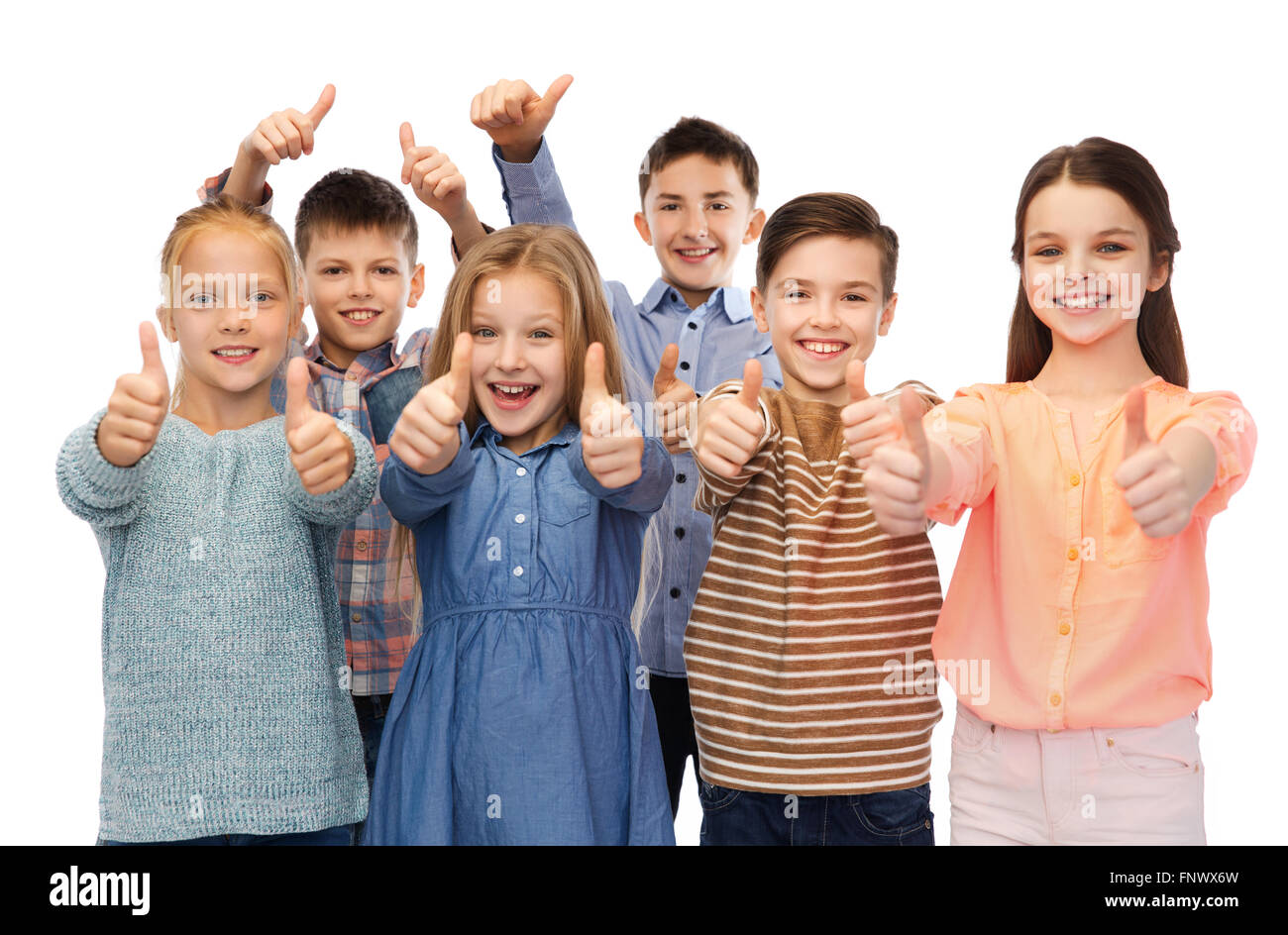 happy children showing thumbs up Stock Photo - Alamy