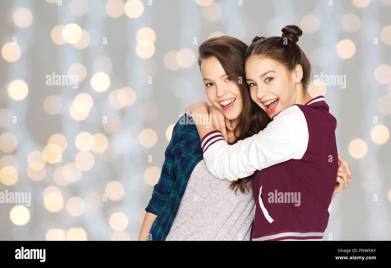 happy smiling pretty teenage girls hugging Stock Photo - Alamy