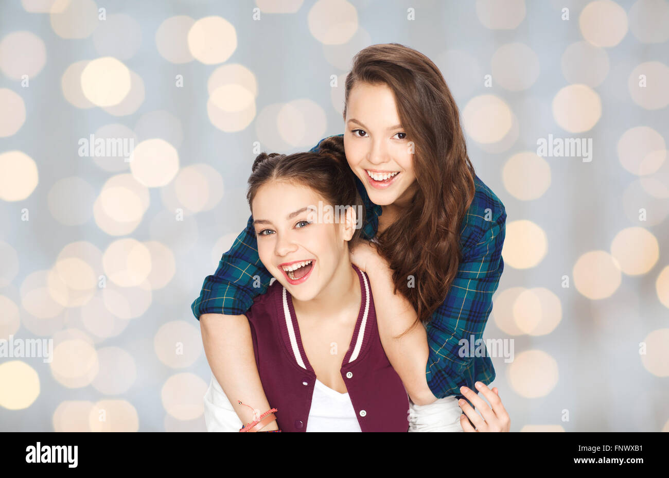 happy smiling pretty teenage girls hugging Stock Photo - Alamy