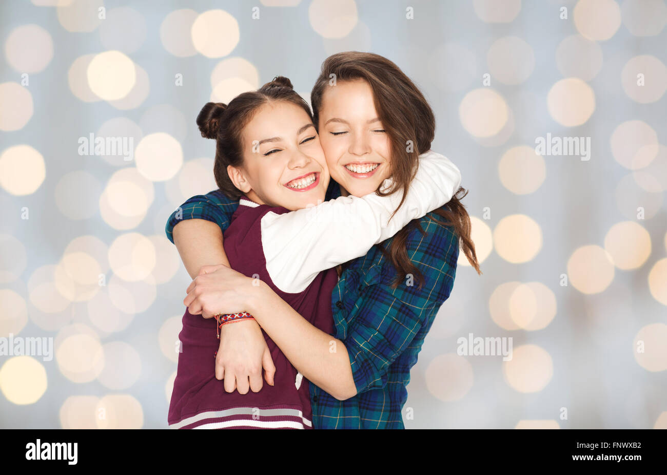happy smiling pretty teenage girls hugging Stock Photo - Alamy