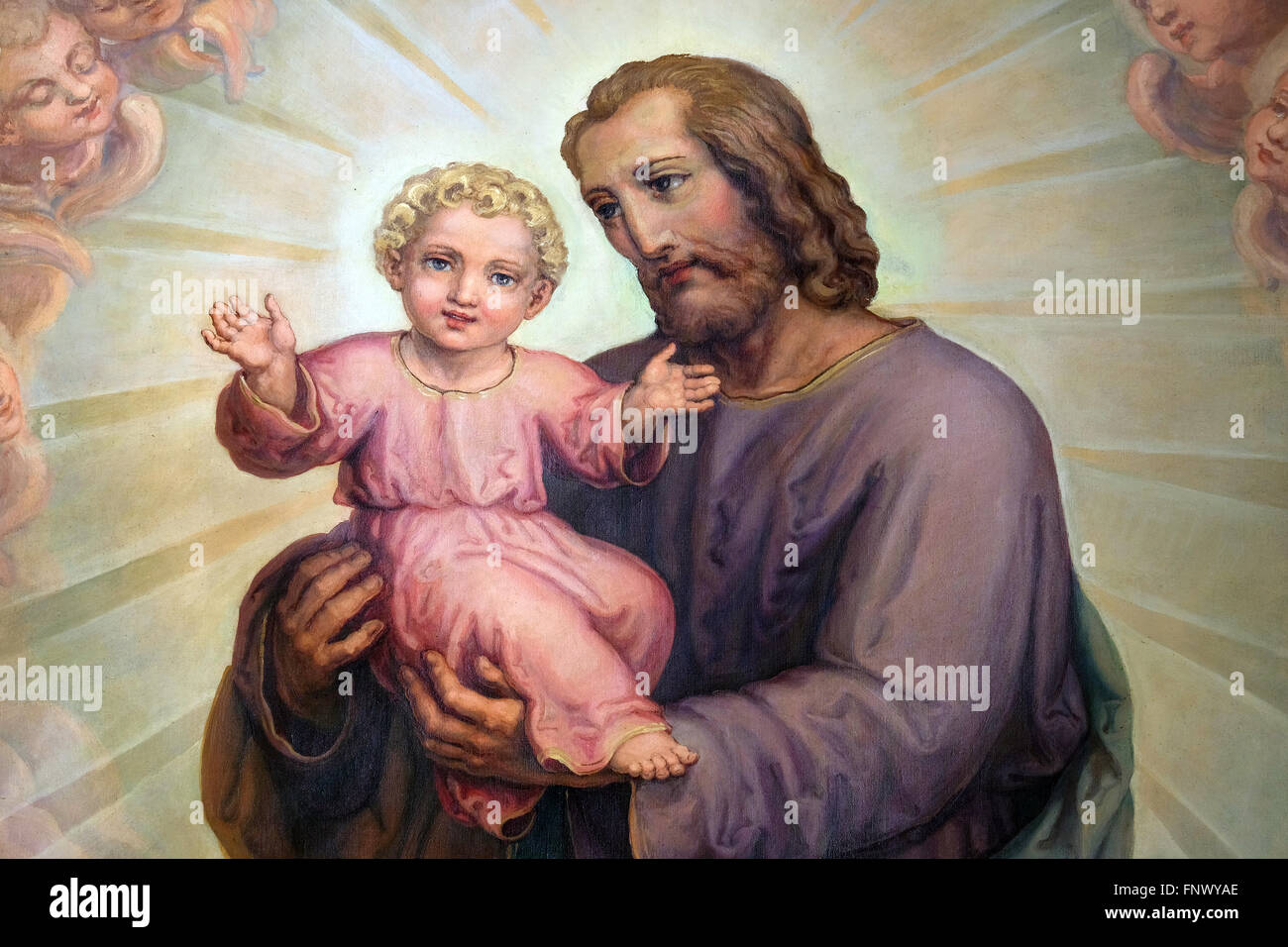 Saint Joseph holding baby Jesus, altarpiece in the Basilica of the