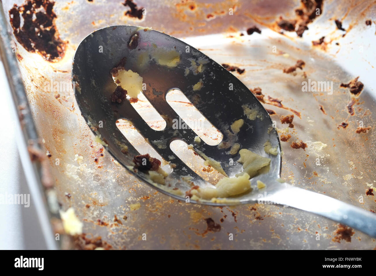 remains of shepherd pie in glass dish Stock Photo