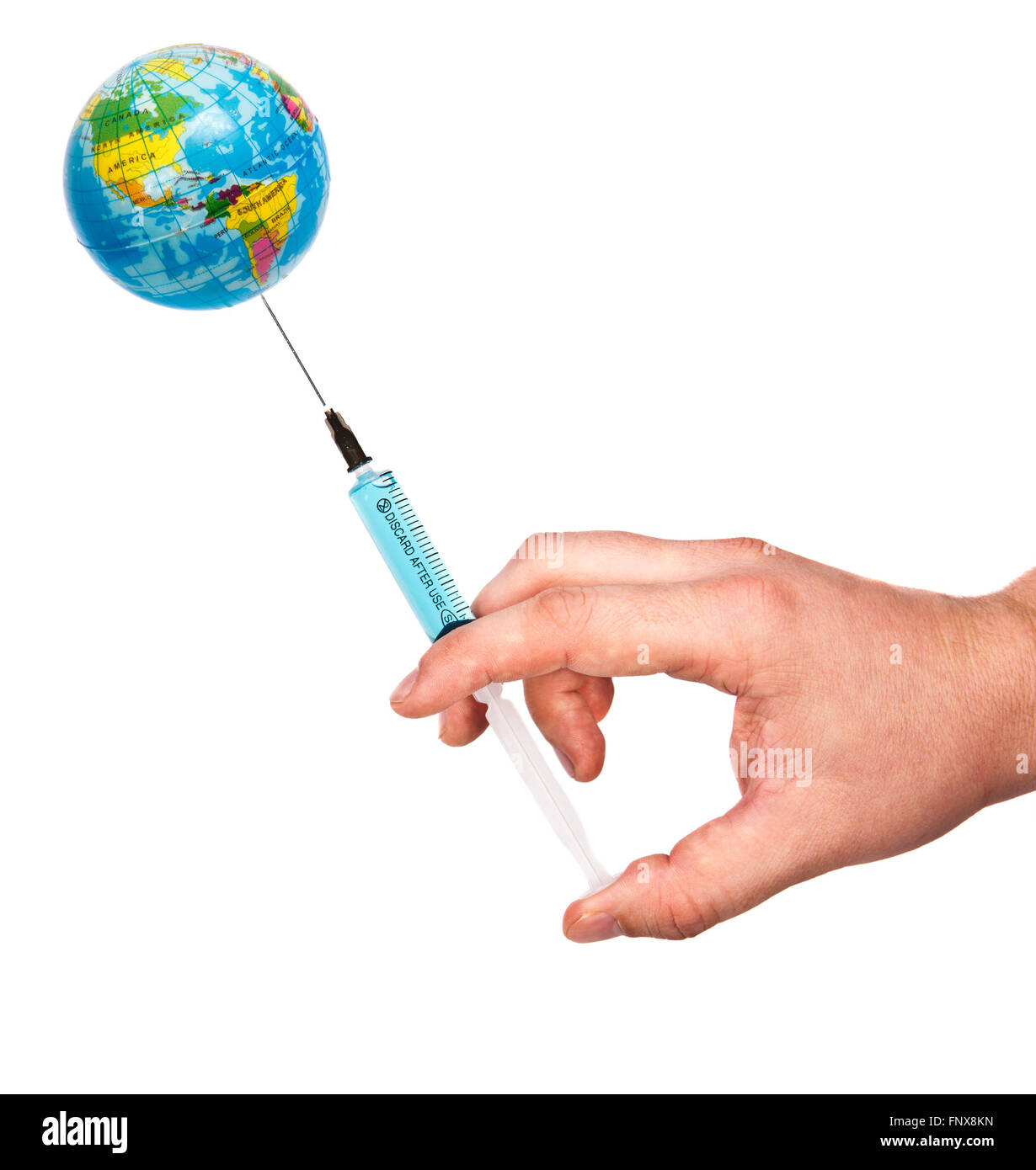 Globe on the needle of the syringe concept. Stock Photo