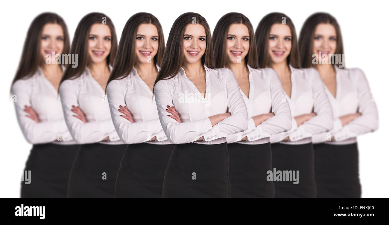 Women clones standing in a row Stock Photo
