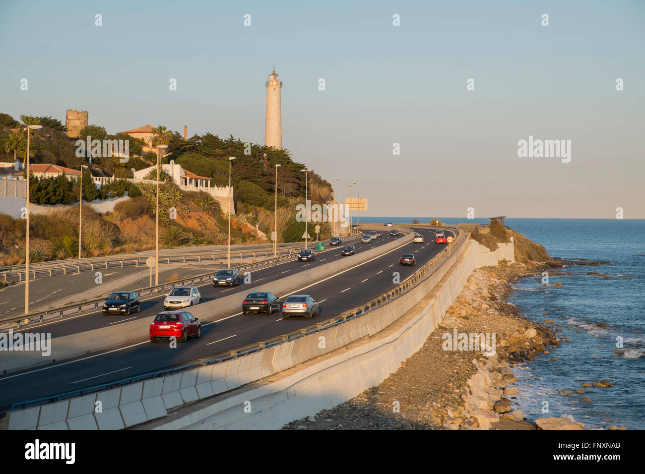 Calaburras lighthouse and the A7/N340 at Mijas Costa. Malaga province, Andalusia. Spain Stock Photo