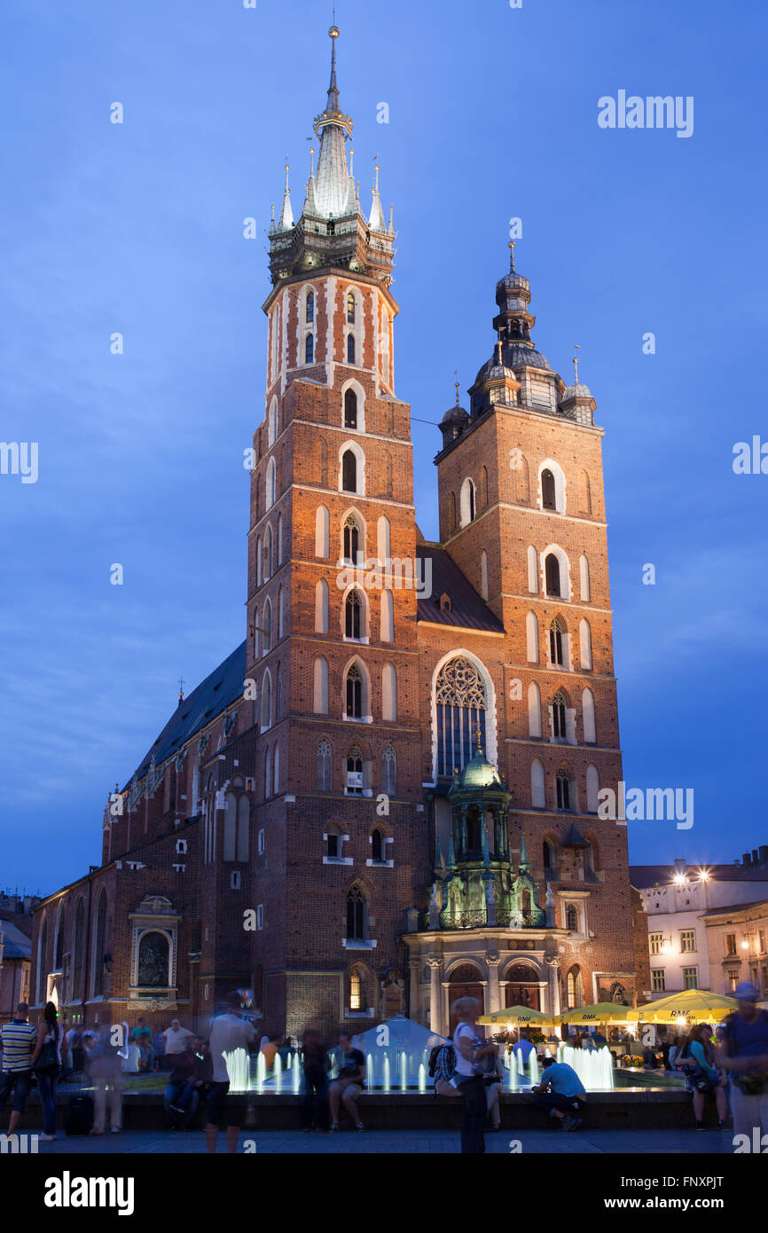Poland, Krakow, Old Town Square, St Mary Basilica (Mariacki Church) by night Stock Photo