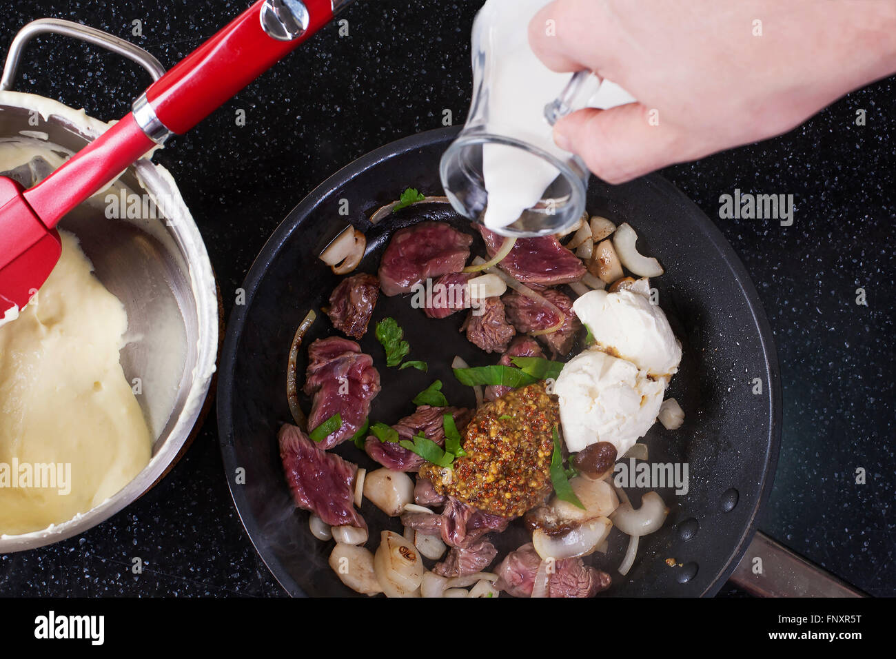Assorted raw ingredients for Beef Stroganoff with mashed potatoes or celery. Top view - Stock image Stock Photo