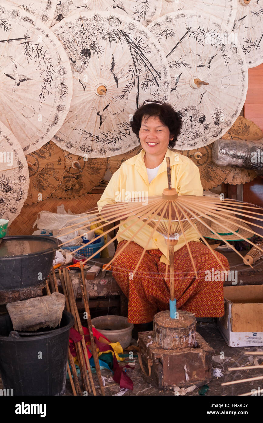 Factory worker assembling umbrellas at the Umbrella Making Center Stock