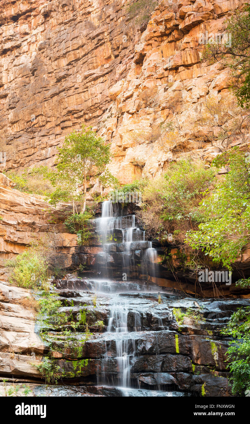 Waterfall in Moremi Gorge, Botswana, Africa flowing down into the gorge Stock Photo