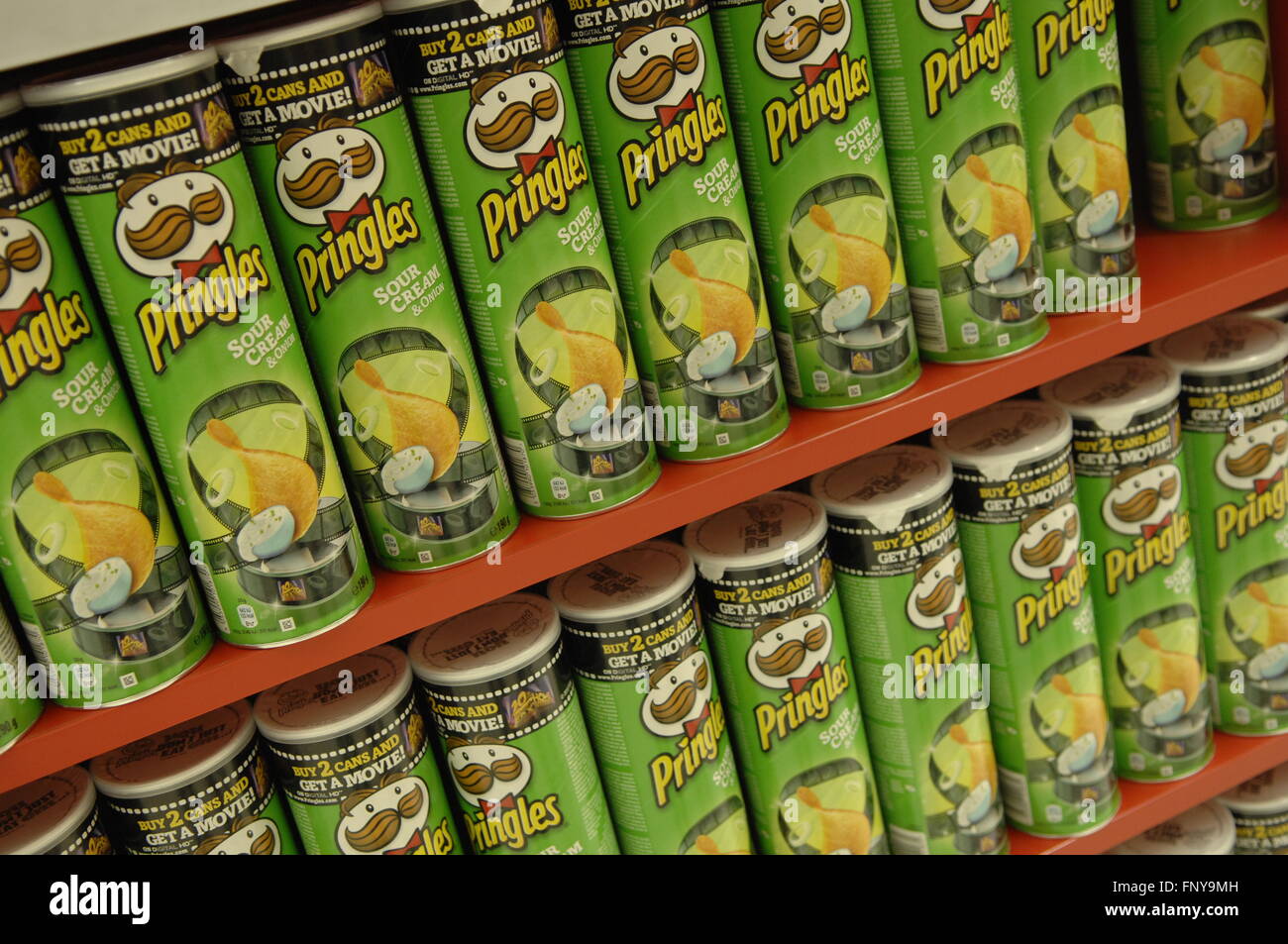 Pringles Display in Supermarket,a brand of the Kellogg Company Stock Photo  - Alamy