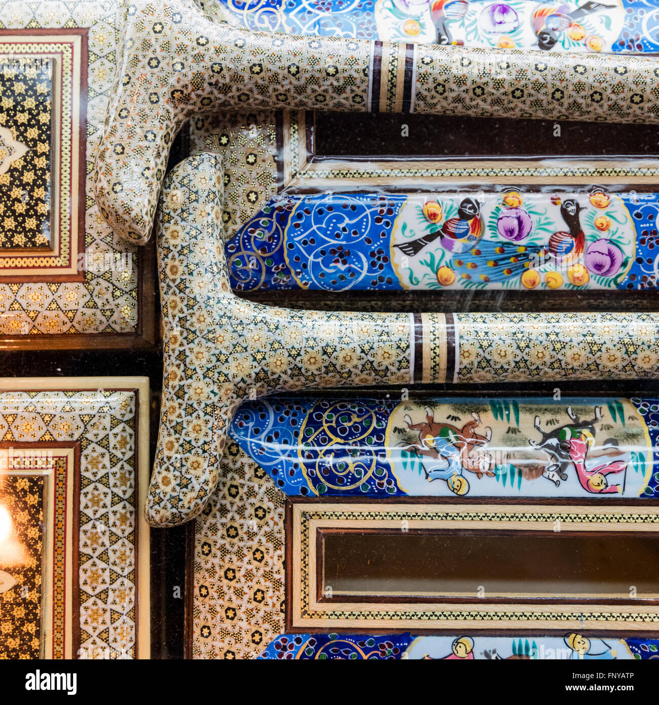 Detail of intricately decorated boxes and canes for sale in a souvenir shop in the Vakil Bazaar Shiraz Iran Stock Photo
