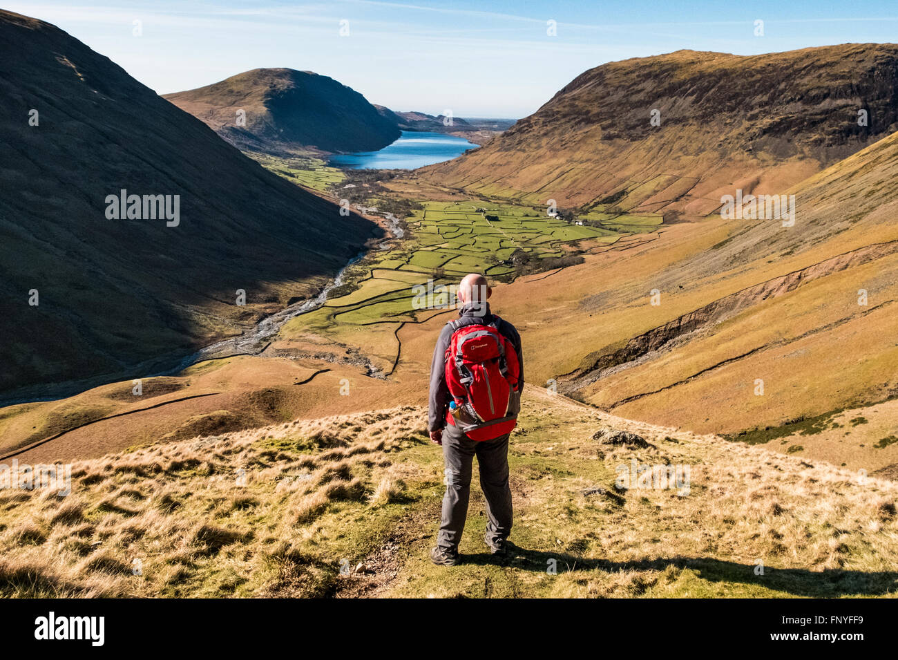 Walker looking towards Wast Water, In the Lake District, Cumbria, UK