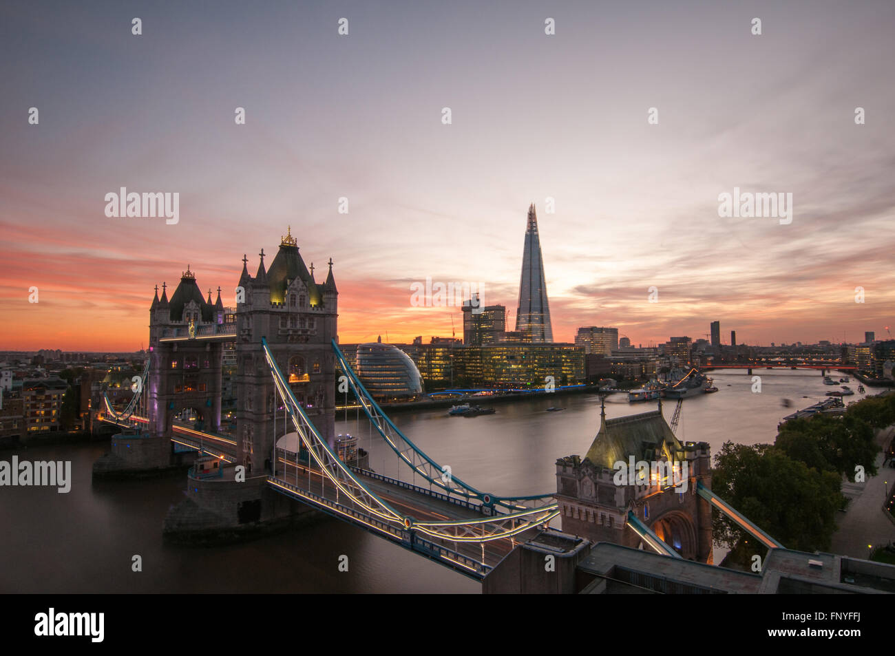 Tower Bridge and the Shard colourful sunset on River Thames in London, England Stock Photo