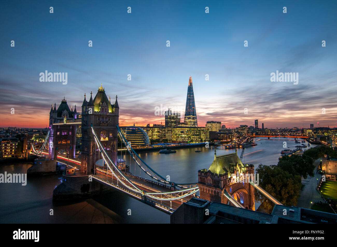 Tower Bridge and the Shard colourful sunset on River Thames in London, England Stock Photo
