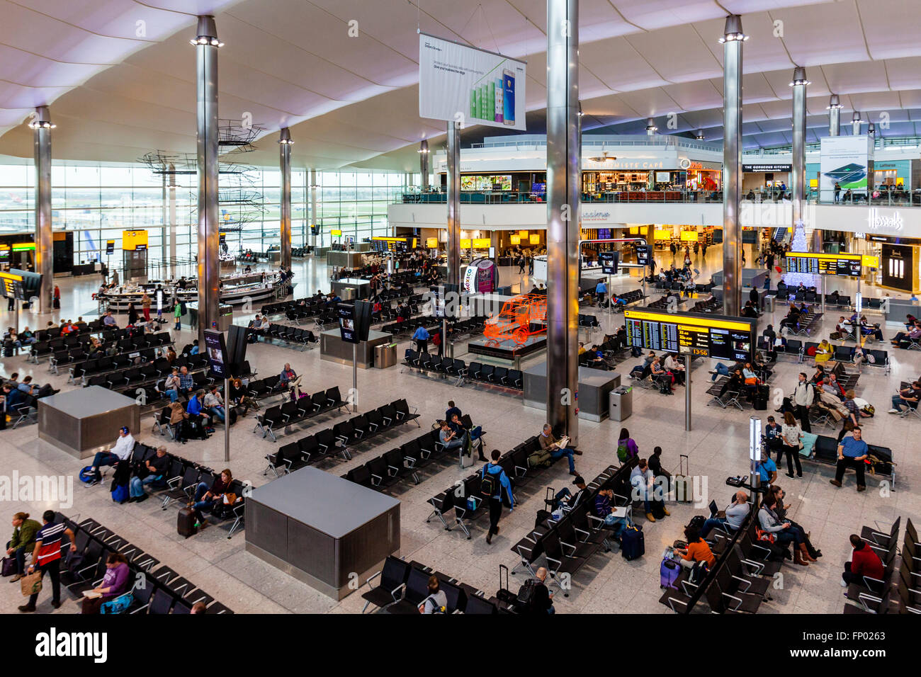 The Departure Lounge At London Heathrow Airport (Terminal 2), London, England Stock Photo