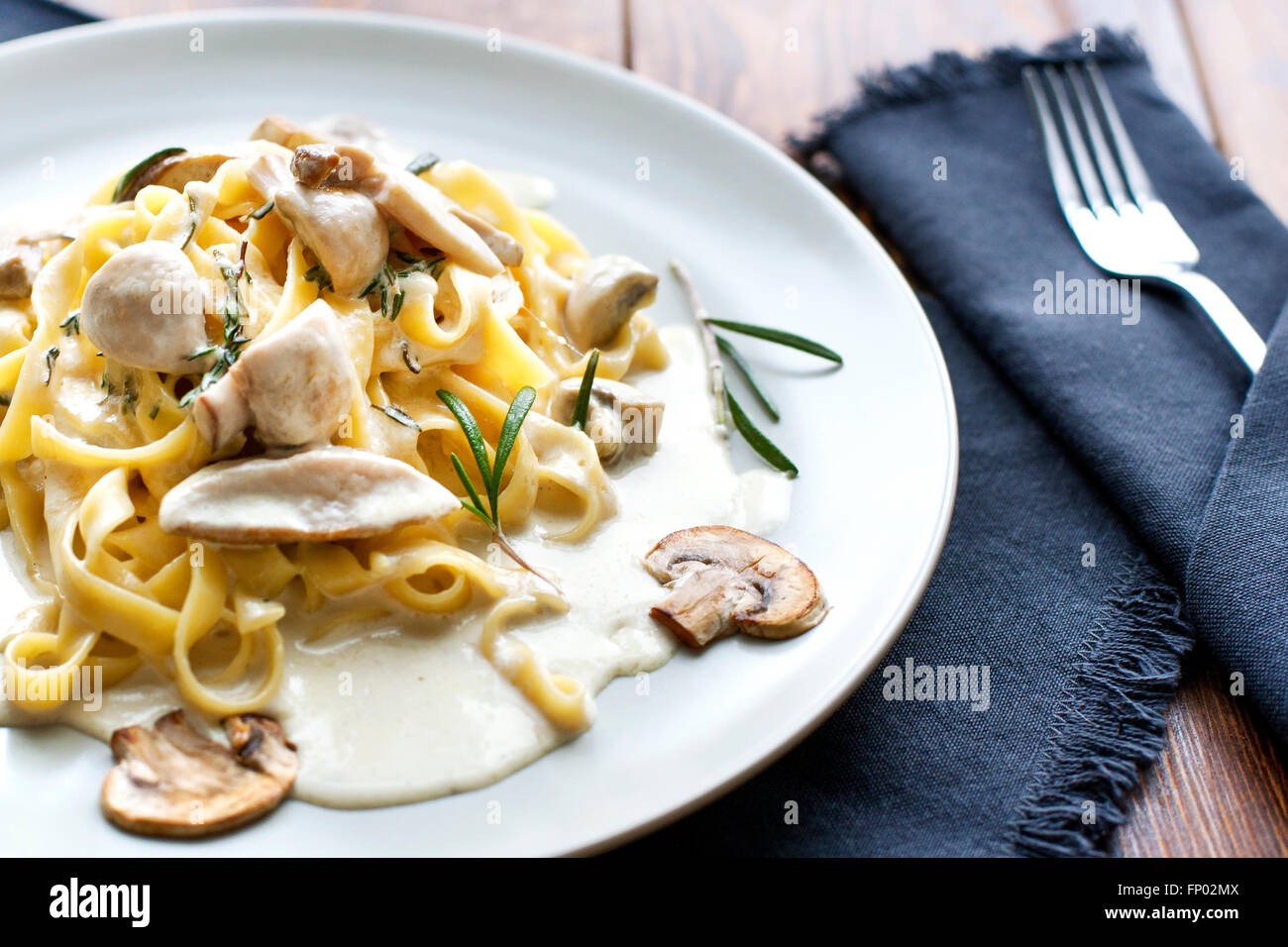 Tagliatelle vegetarian Pasta Dish with Mushrooms - Stock image Stock Photo