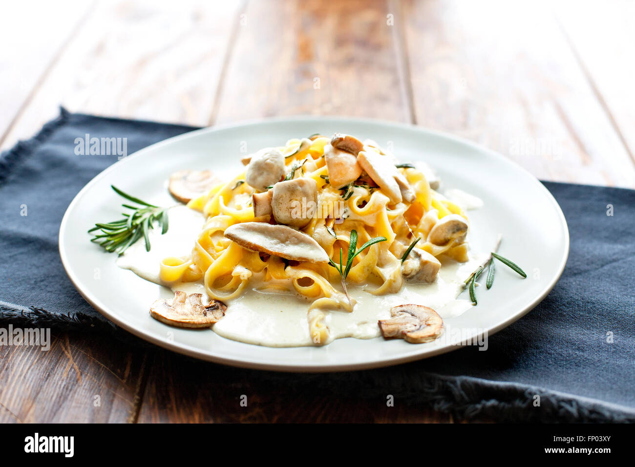 Tagliatelle vegetarian Pasta Dish with Mushrooms - Stock image Stock Photo