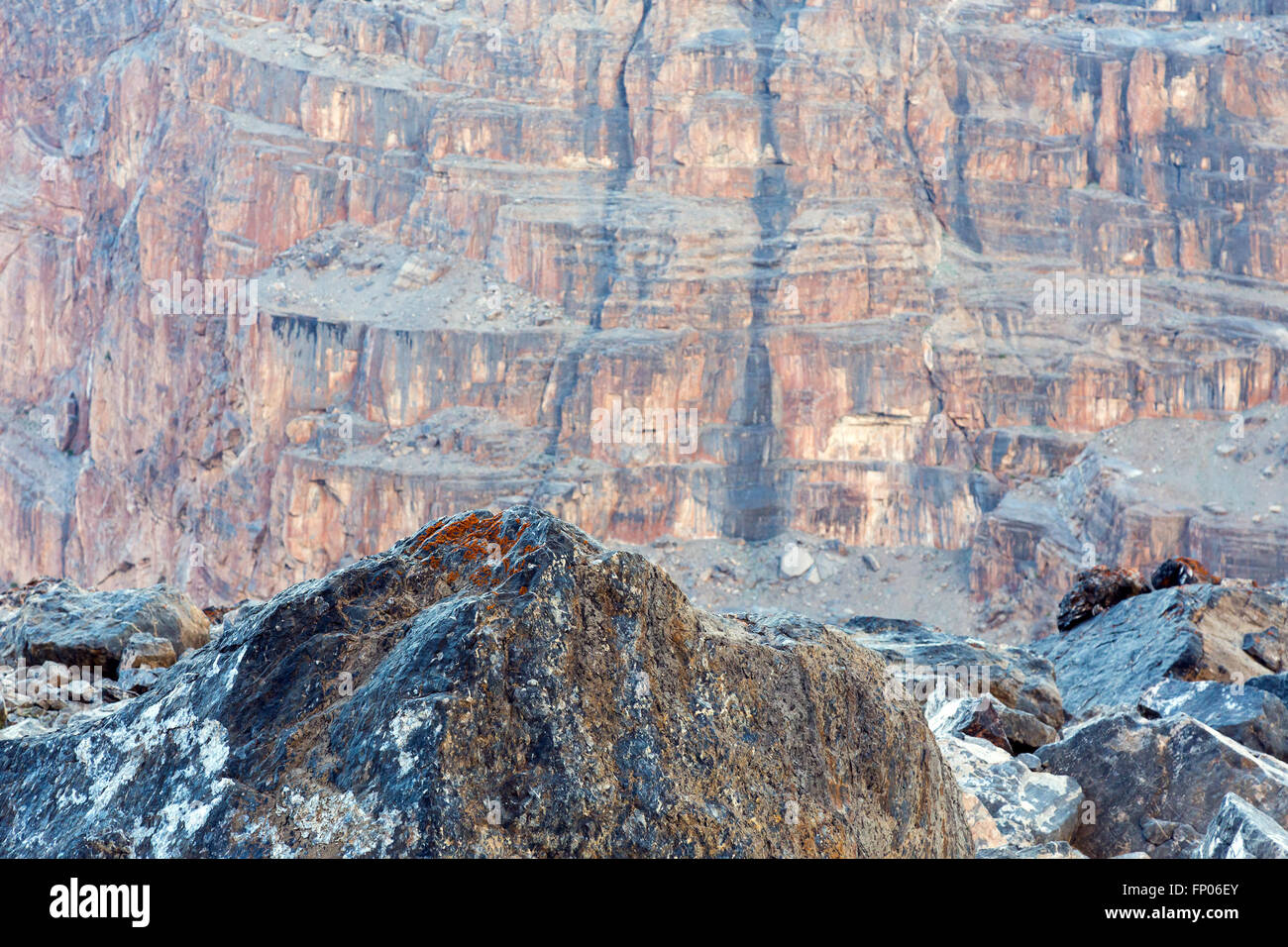 Sharp Grey Rocky Ridge and Blurred Orange Mountain Stock Photo - Alamy