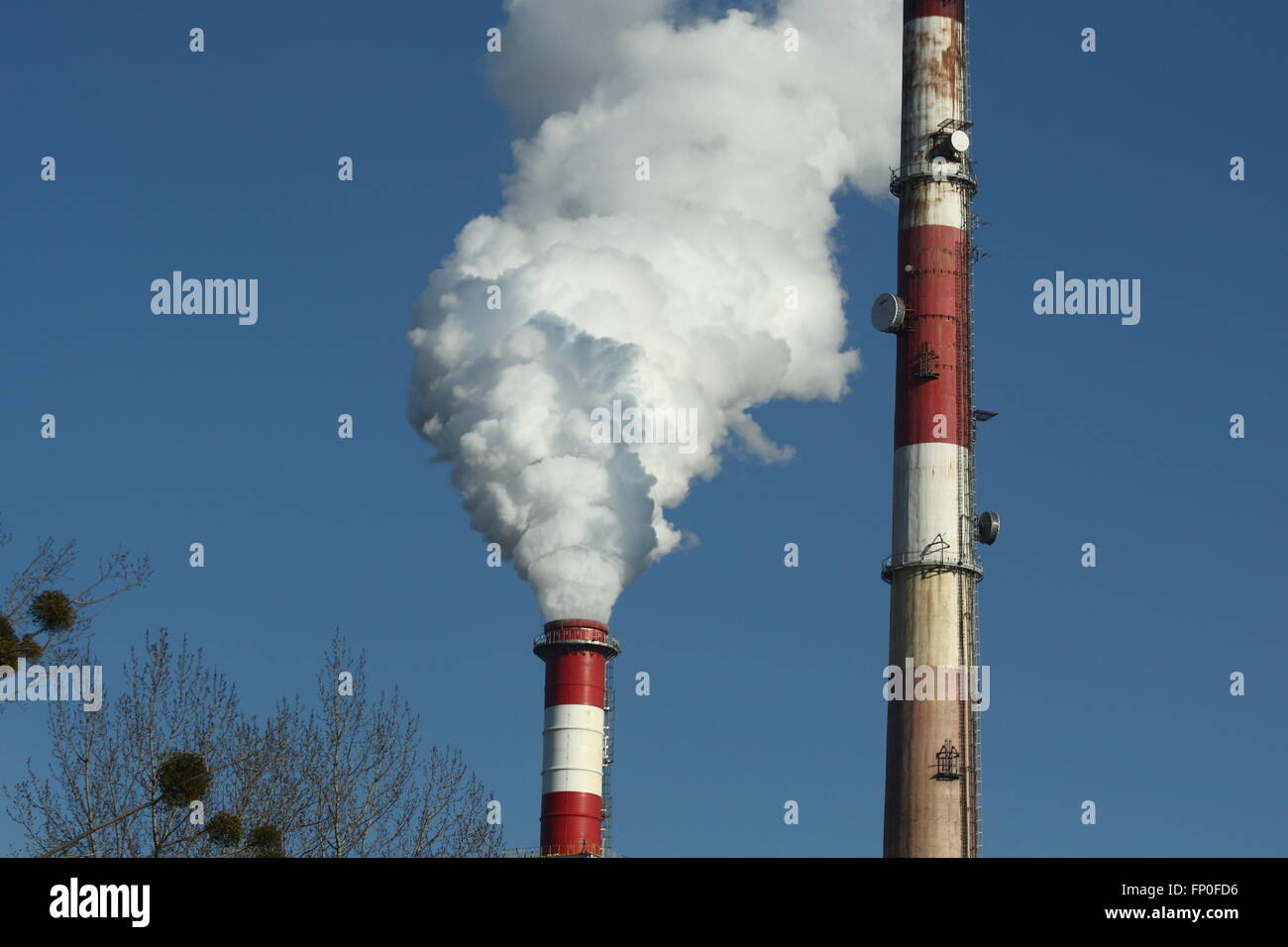 Gdansk, Poland 16th, March 2016 WHO (World Health Organization) says nearly a quarter of all deaths in 2012 were caused by environment-related factors such as air, water, and soil pollution, as well as unsafe roads and stressful work environments. Pictured: Smoking chimneys ow Gdansk power plant. Credit:  Michal Fludra/Alamy Live News Stock Photo