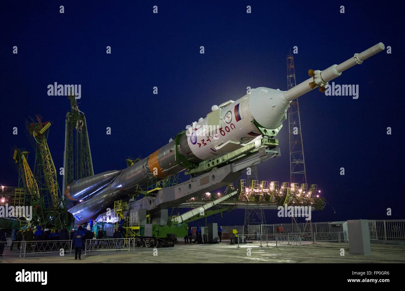 Baikonur, Kazakhstan. 16th Mar, 2016. The Soyuz TMA-20M spacecraft is raised into position on the launch pad at the Baikonur Cosmodrome March 16, 2016 in Kazakhstan. Launch of the Soyuz rocket is scheduled for March 19 and will carry Expedition 47 Russian cosmonauts Alexey Ovchinin and Oleg Skripochkato along with American astronaut Jeff Williams to the International Space Station. Credit:  Planetpix/Alamy Live News Stock Photo
