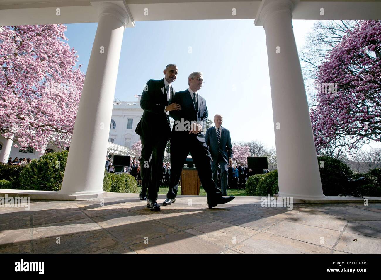 Washington DC, USA. 16th March, 2016. U.S. President Barack Obama walks through the Colonnade from the Rose Garden with Chief Judge Merrick B. Garland after announcing his nomination to the United States Supreme Court at the White House March 16, 2016 in Washington, DC. Stock Photo