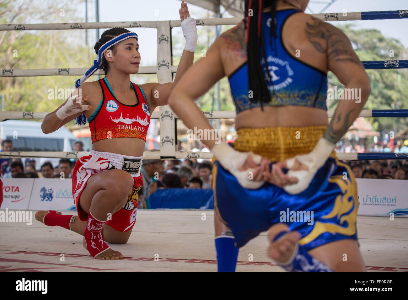 Ayutthaya, Thailand. 17th Mar, 2016. This picture shows women performing a ritual dance before the fight during the 12th World Wai Kru Muay Thai Ceremony.The 12th World Wai Kru Muay Thai Ceremony is being held near the famous Wat Maha That Temple in Ayutthaya Historical Park and attract every year more than 1200 Muay Thai fighters from 57 countries to showcase some of the sacred martial art rituals of Muay Thai Boxing. Credit:  Guillaume Payen/ZUMA Wire/Alamy Live News Stock Photo