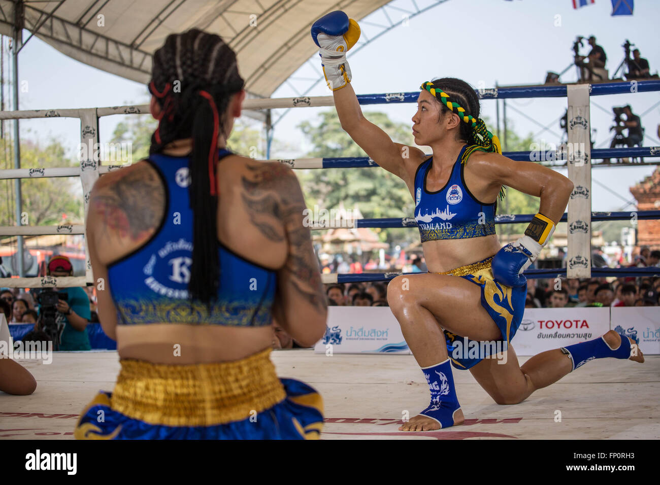 Ayutthaya, Thailand. 17th Mar, 2016. This picture shows women performing a ritual dance before the fight during the 12th World Wai Kru Muay Thai Ceremony.The 12th World Wai Kru Muay Thai Ceremony is being held near the famous Wat Maha That Temple in Ayutthaya Historical Park and attract every year more than 1200 Muay Thai fighters from 57 countries to showcase some of the sacred martial art rituals of Muay Thai Boxing. Credit:  Guillaume Payen/ZUMA Wire/Alamy Live News Stock Photo