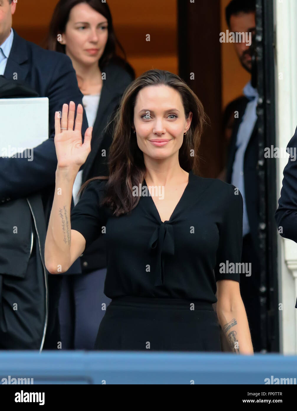 Athens, Greece - March 16, 2016: Hollywood star and UN refugee agency envoy Angelina Jolie leaves the Greek Prime minister's office in Athens following a meeting with Greek Prime minister Credit:  VASILIS VERVERIDIS/Alamy Live News Stock Photo