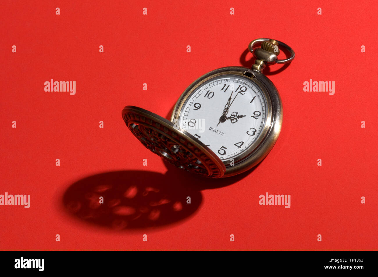 Pocket Watch on red Stock Photo