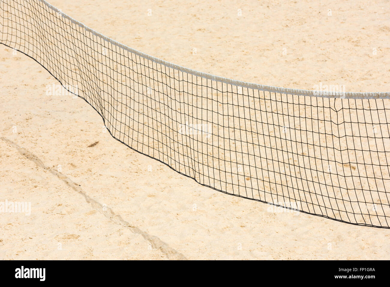 volleyball net on empty sand beach. horizontal shot Stock Photo - Alamy