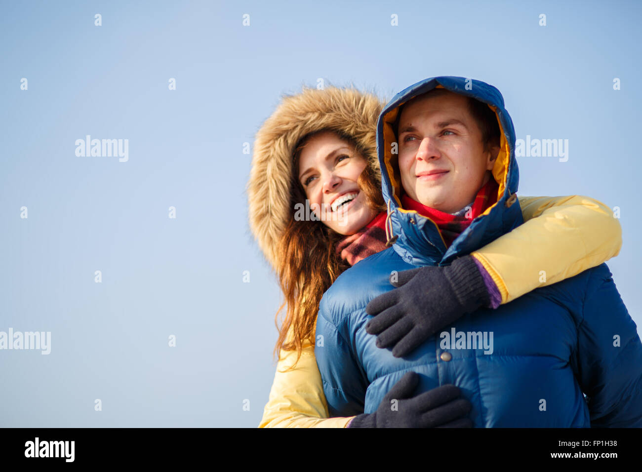beautiful couple embracing in winter Stock Photo - Alamy
