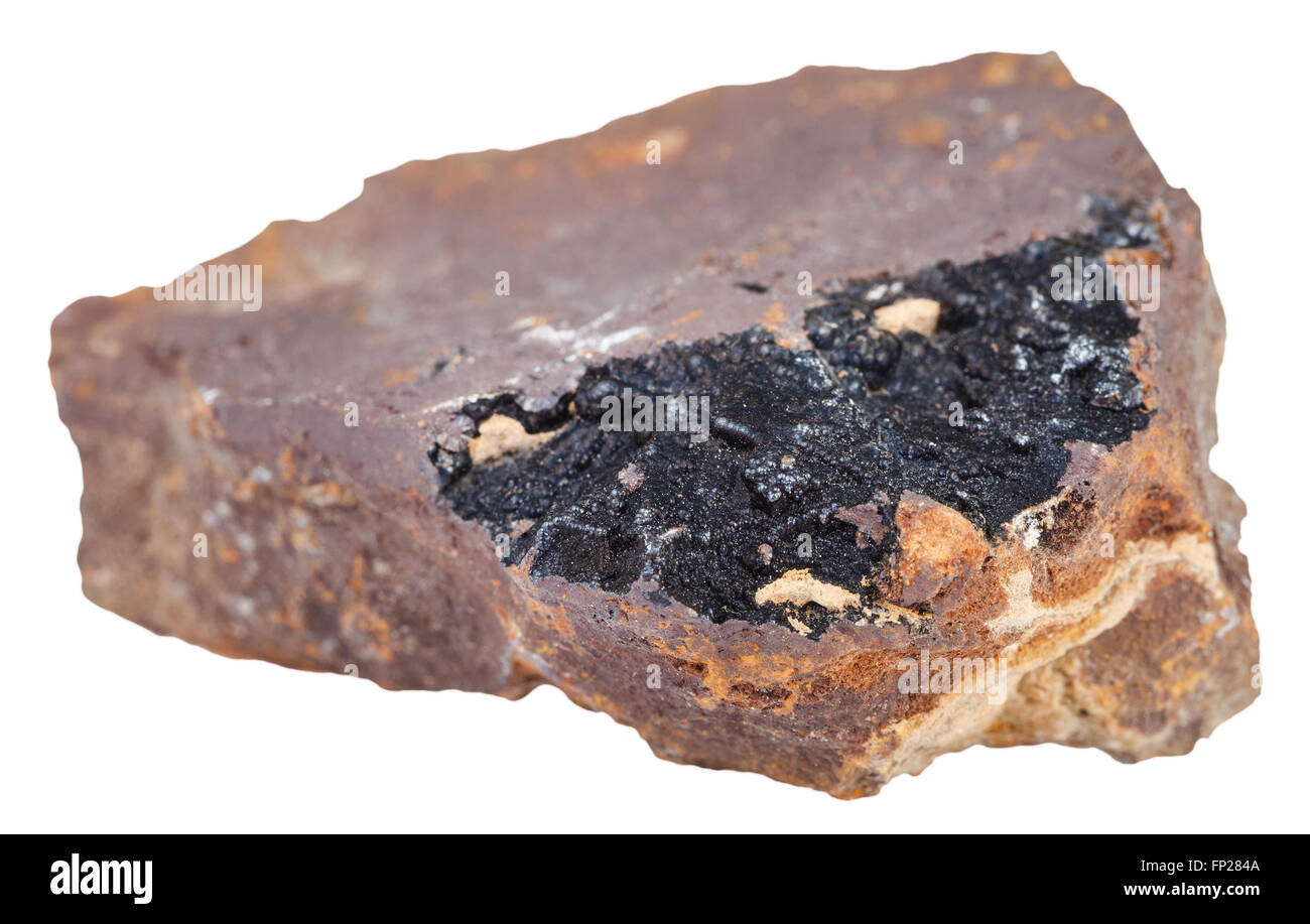 macro shooting of natural rock specimen - piece of limonite (brown hematite, iron ore) stone with goethite mineral isolated on w Stock Photo
