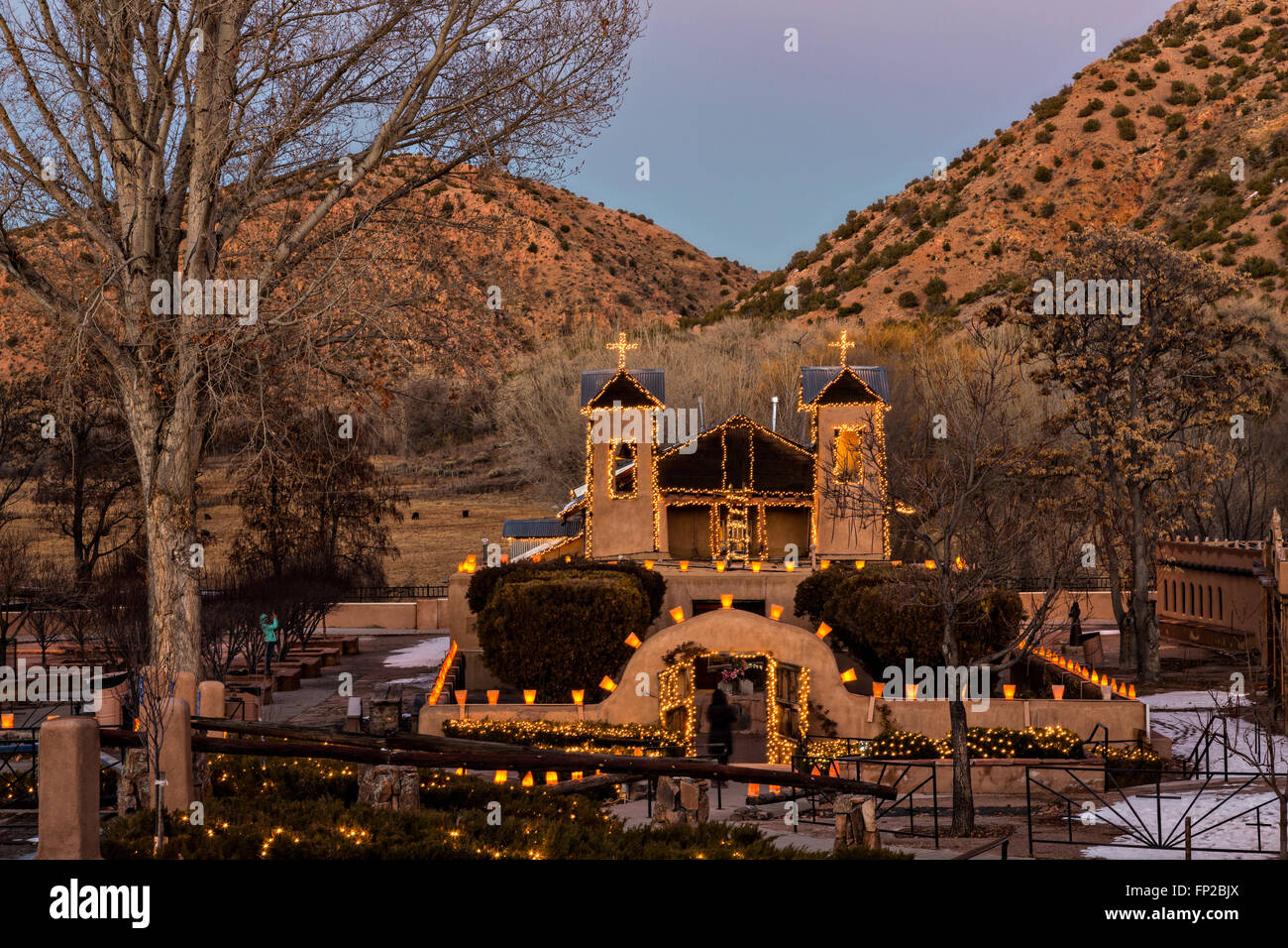 El Santuario de Chimayo Historic Site illuminated by hundreds of small