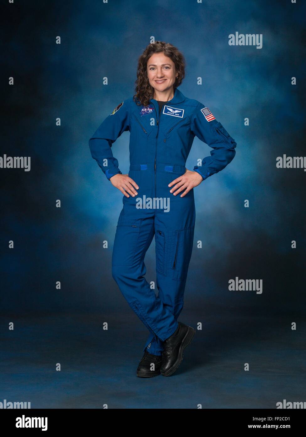 American astronaut Jessica Meir official portrait wearing blue flight suit at the Johnson Space Center February 24, 2016 in Houston, Texas. Stock Photo