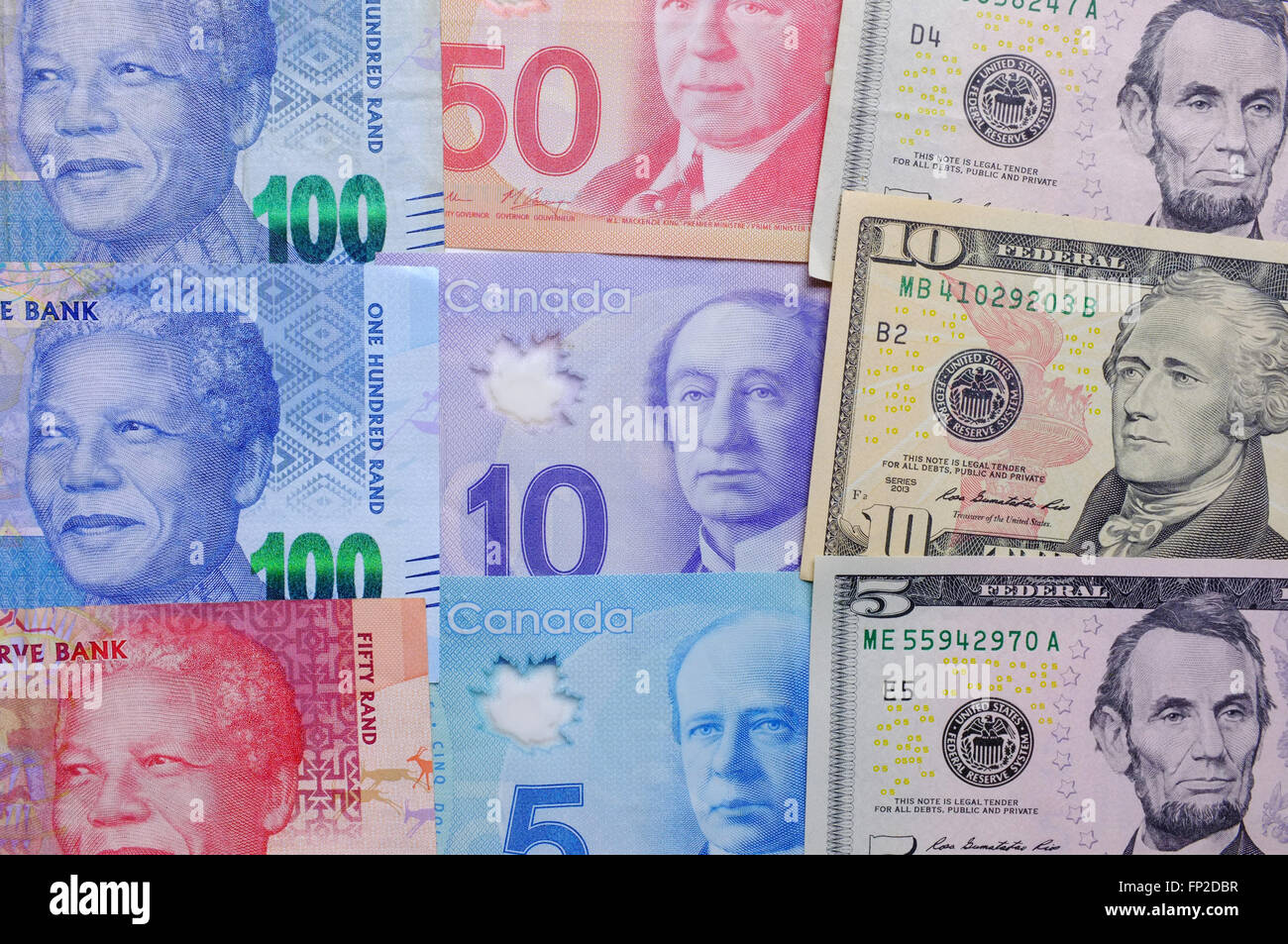 american-and-canadian-dollars-with-south-african-rand-notes-stock-photo