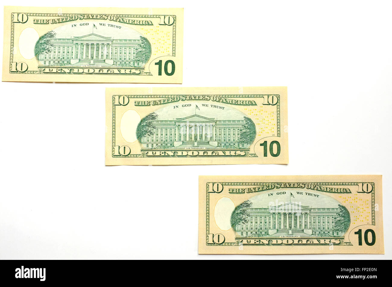 Three American $10 notes photographed against a white background Stock Photo