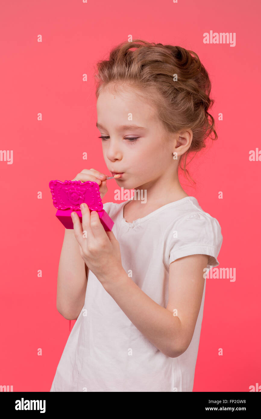 Makeup teen girl. Cute cosmetics woman having fun with makeup products